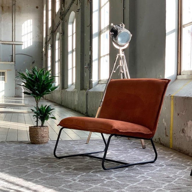 De industriële fauteuil Dante cognac
